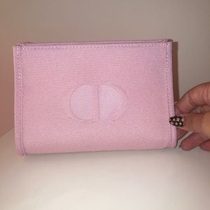 Any pink mini Dior makeup pouch